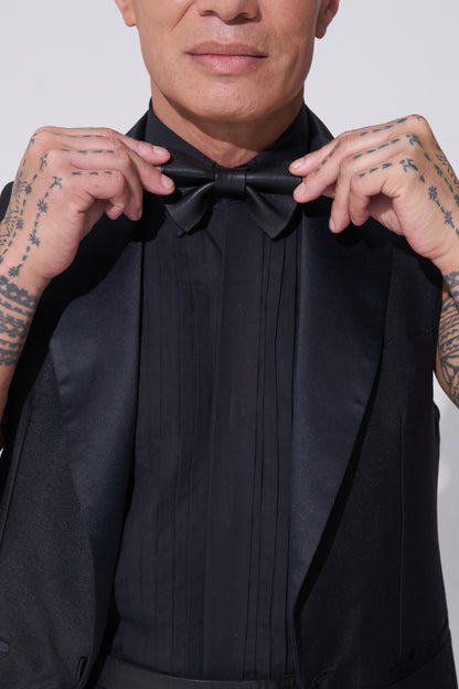 Endemann leather bow tie and sleeveless jacket and sleeveless shirt