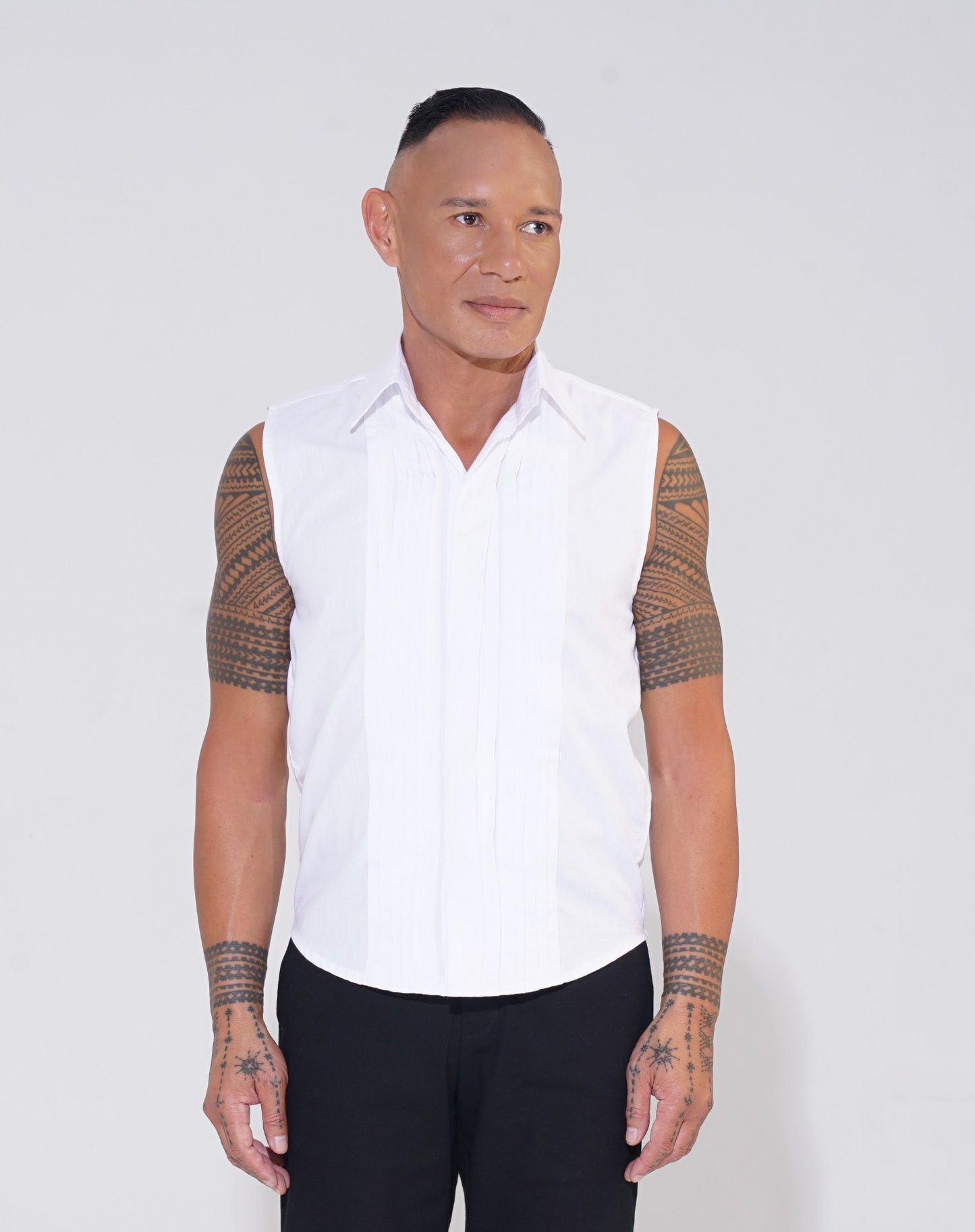 white pleat front sleeveless shirt